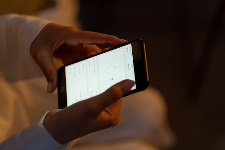 Patient using digital therapeutic app for SUD recovery while consulting with counselor