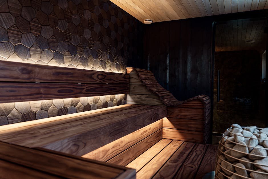 A home wellness setup with infrared sauna and stock tank cold plunge in a garage