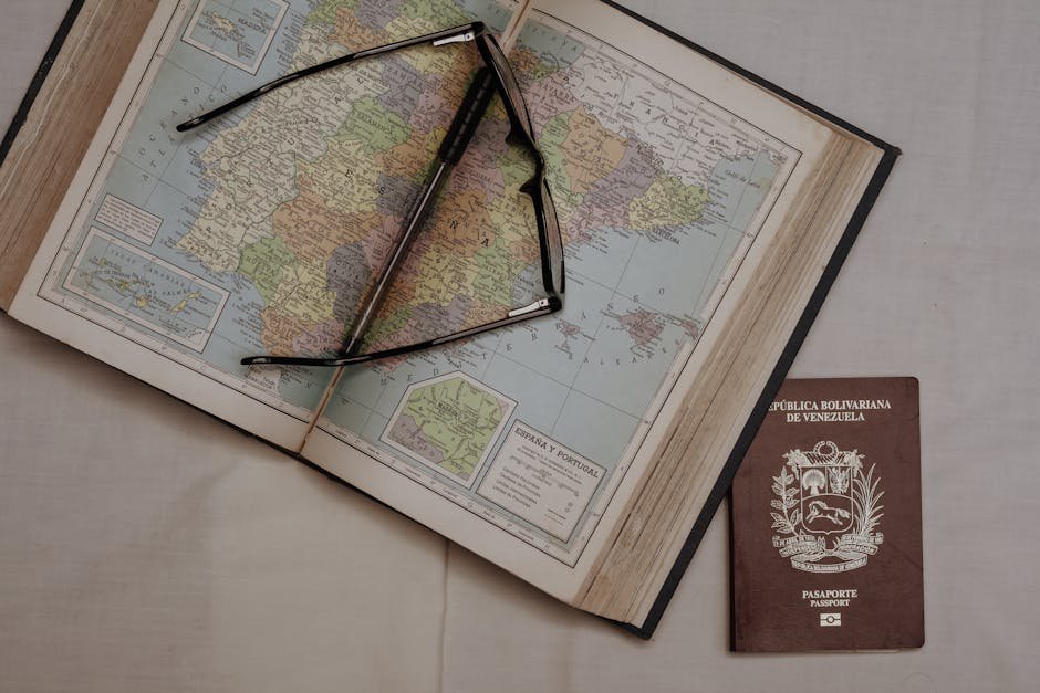 World map with insurance documents and travel itinerary