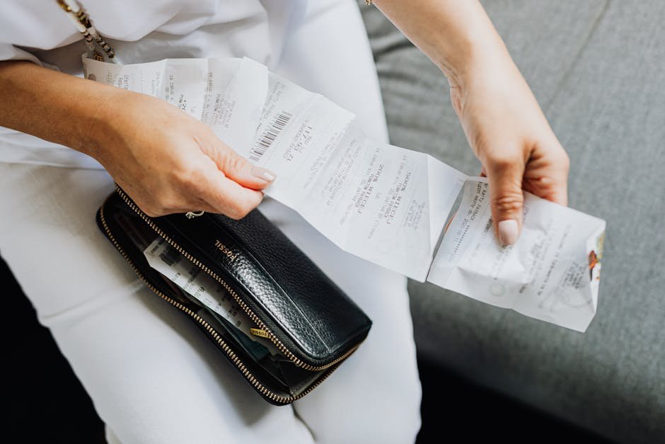 Person reviewing medical bills and budget at home