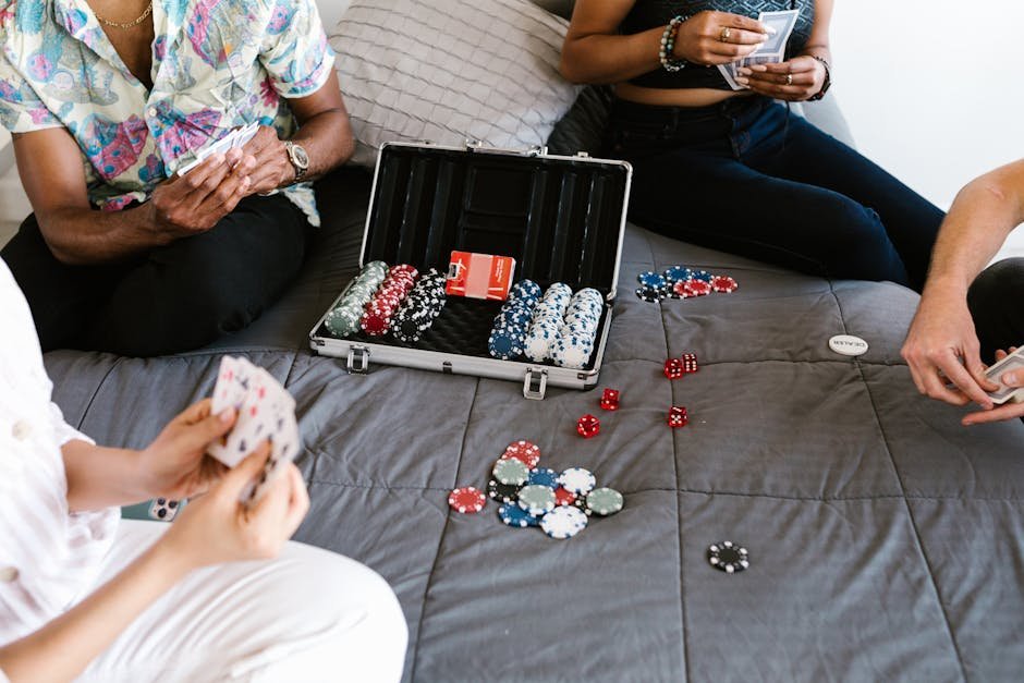 Friends at home poker night with chips and cards no money present